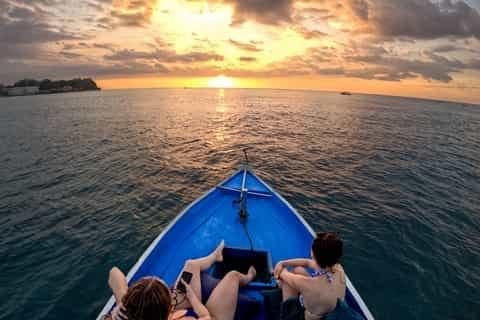 Looking forward from the bow toward the sunset