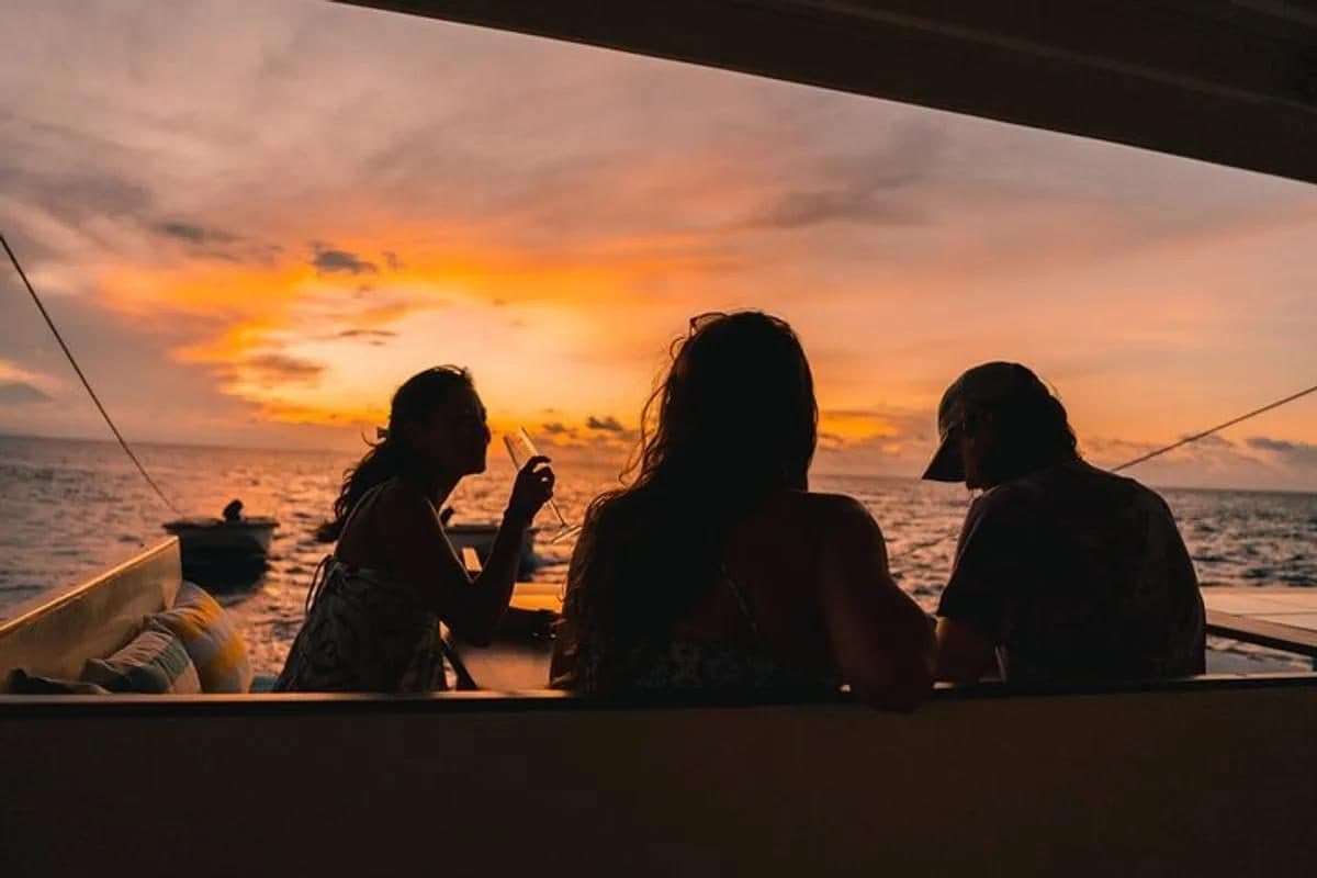 Friends watching the Gili sunset from the boat
