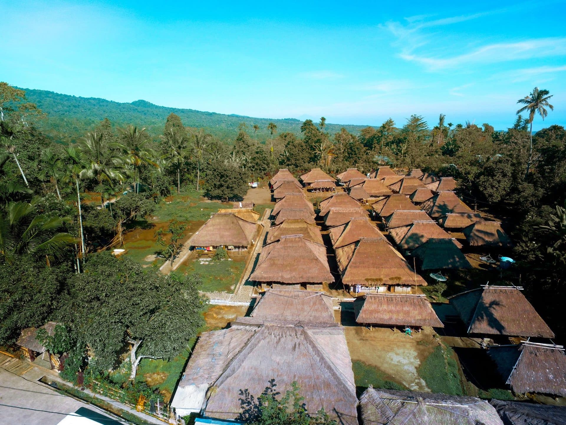 Aerial view of Senaru’s traditional thatched compound in the highland forest