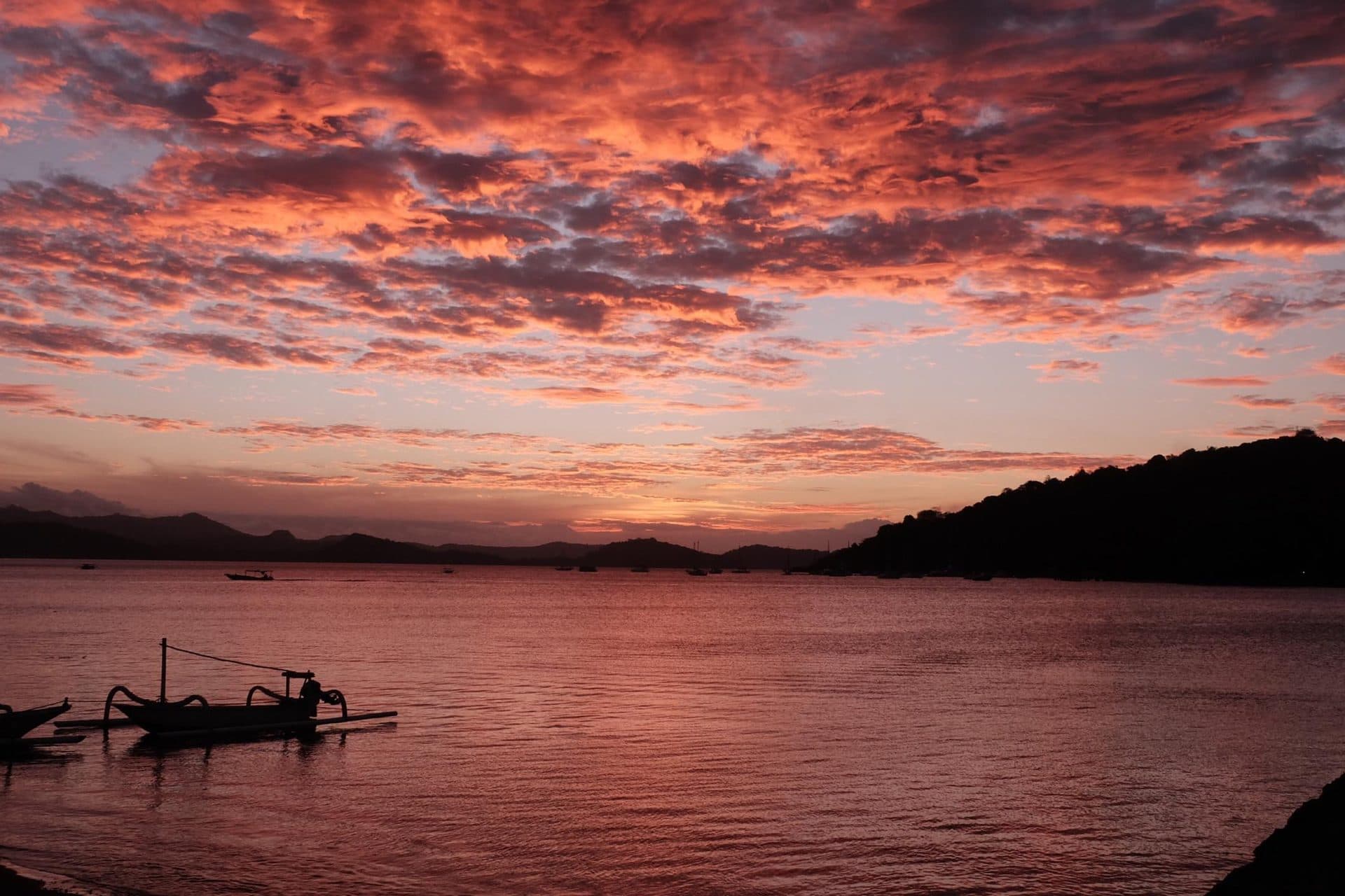 Sunset over the water around Gili Gede