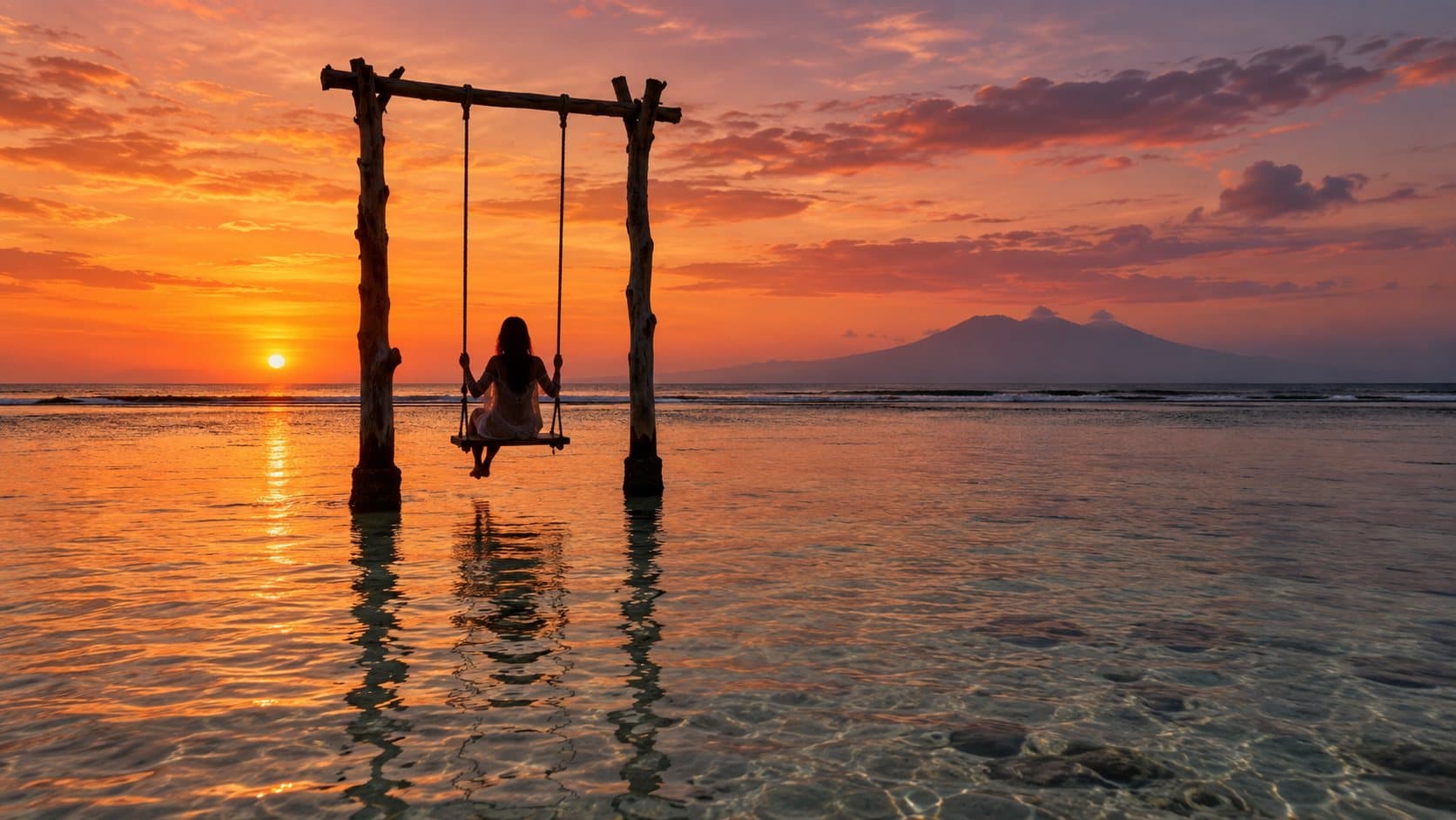 Sunset swing on Gili Trawangan, the destination of boats from Bangsal