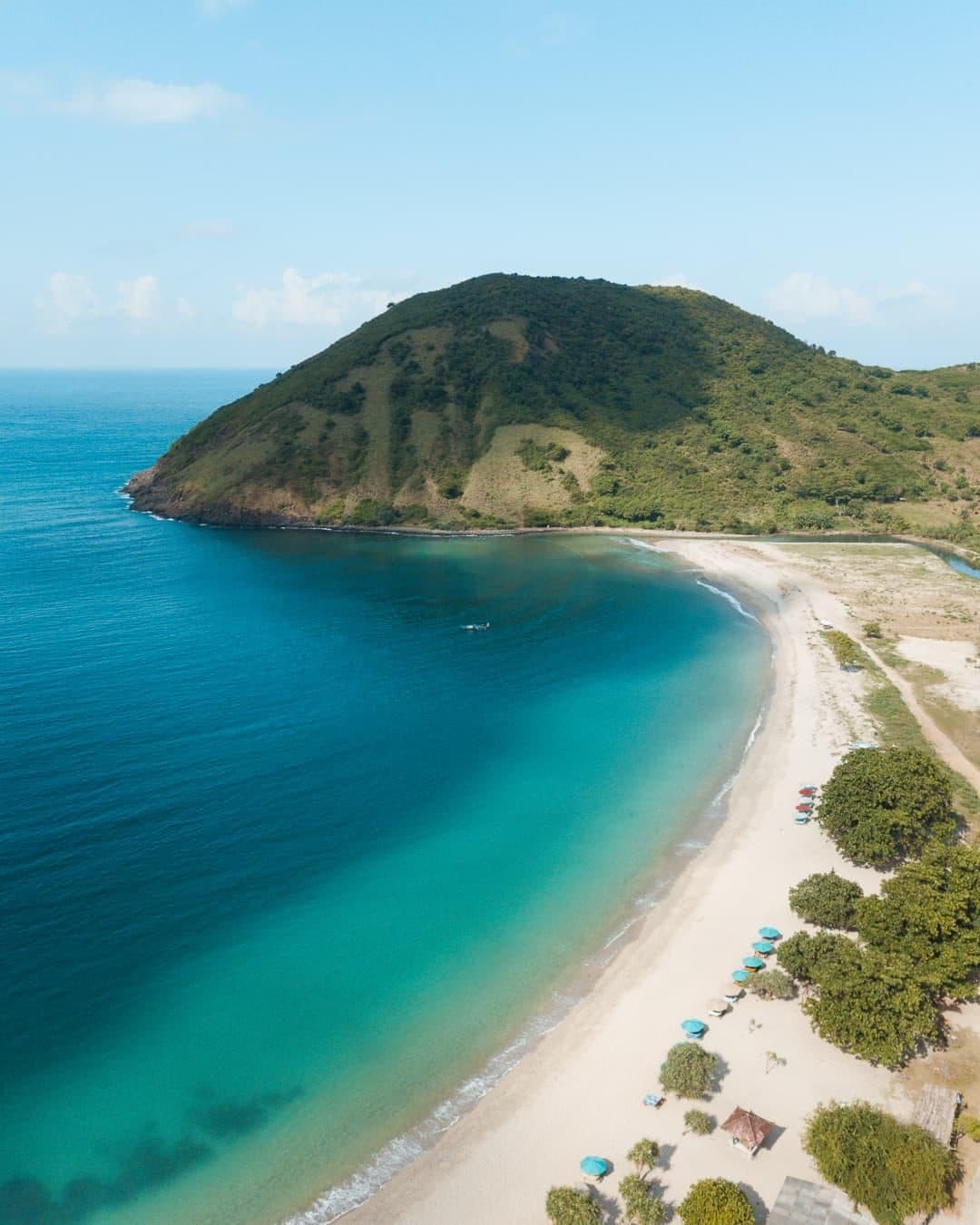 Green headland above Mawun Beach