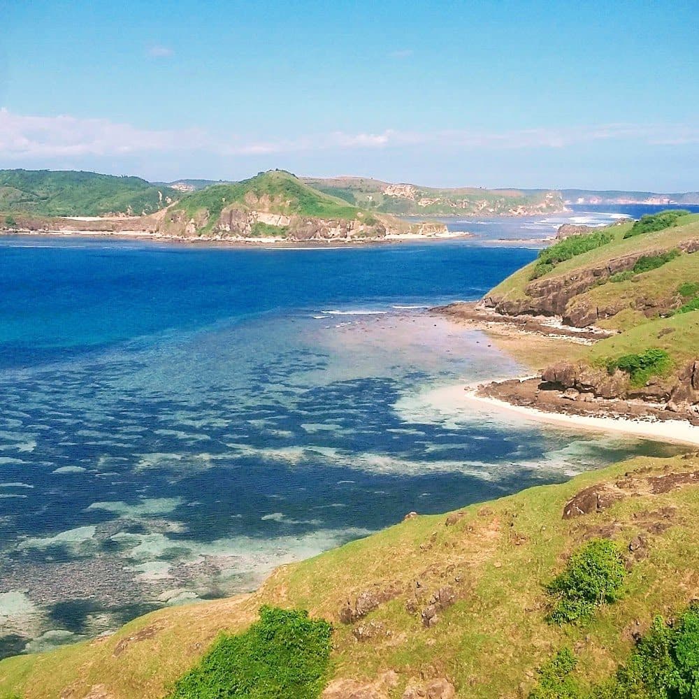 Hilltop view over the Tanjung Aan coastline