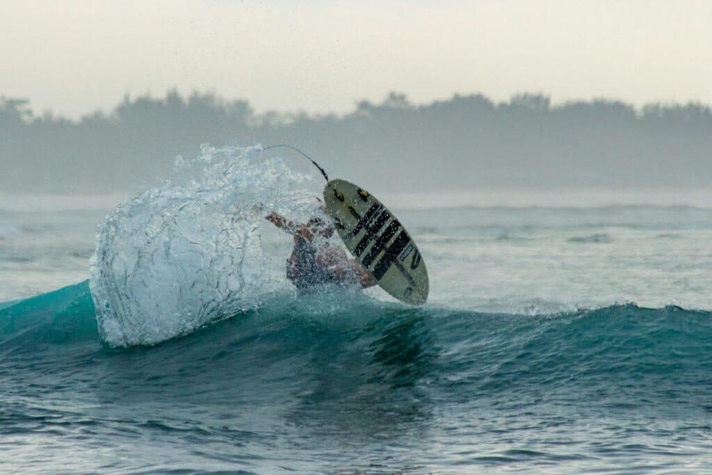 Board kicking out of a wave